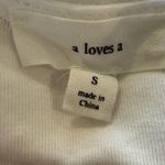 A loves A  white eyelet puff sleeve shirt. Size Small Photo 6