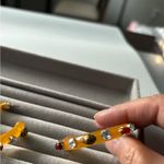 Kurt Geiger  Gold and Red Embellished Earrings Photo 3