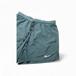 Nike ADV Running Shorts Women's Large Teal Green Split Hem Back Zip Pocket Photo 1