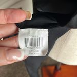 BCBGMAXAZRIA  Women's Relaxed Flare V Neck High Low Asymmetrical Hem Blouse Photo 1