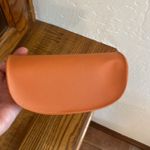 Tory Burch Orange sunglass case Photo 2