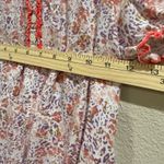 Women's Floral Smocked Blouse Short Sleeve Button Front Ruffle Trim Top Pink Photo 4