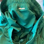 Lululemon Discontinued emerald ice green hotty hots, size 0, and free to be wild sports bra, size 2. Photo 6