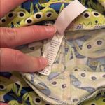 LuLaRoe Leggings with Toy Story Green and Blue Alien Design Photo 3