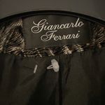 Giancarlo Ferrari faux fur black and gray
jacket. Zipper front. Preowned Size 4 Photo 1