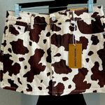 Ashley Mason  Brown and Cream Patterned Mini Skirt Photo 1