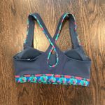 Adidas Blue and Pink Sports Bra with Geometric Design Photo 1