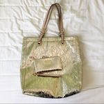 Michael Kors gold metalic tote bag and wallet set Photo 0