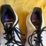 Nike  Cream and Purple Running Shoes Photo 2