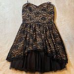 B. Wear Black Lace Mini Dress Photo 0