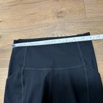 Girlfriend Collective XS leggings with pockets - black, 7/8 ankle. Photo 7