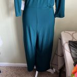 SuperFoxx Teal Faux Wrap pleated front stretch 3/4 sleeve jumpsuit Blue Size M Photo 9