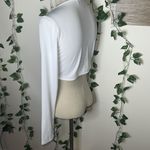 Just Quella  White O-Ring Longsleeve Crop Top Photo 2