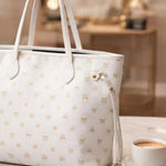 Skull Print White Tote Bag Gold Tone Hardware Cinch Sides Photo 0