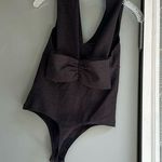 EXPRESS RIBBED PLUNGE NECK BOW BACK THONG BODYSUIT Photo 0