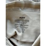 SKIMS Seamless Sculpt High Waisted Mid Thigh Short
Clay Size Small Photo 8