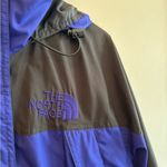 The North Face Blue and Black Hooded Windbreaker Jacket Women's Size Medium Photo 1