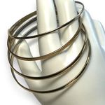 Womens Set of 4 Metal Fashion Statement Bracelet Bangles Gold Tone Photo 0