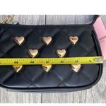 Juicy Couture  Black Quilted Wristlet with gold-tone heart accents Photo 1