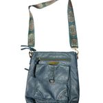 Stone Mountain Crossbody faux leather bag with guitar strap Photo 0