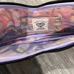 Cosmetic pouch in cat eye shape. Love Bravery by Lady Gaga and Elton John Black Photo 3