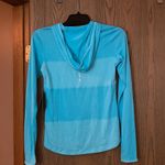 Nike Running Medium Blue on Blue Dry-Fit Shirt with Thumb Holes. Photo 1