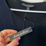 Alison Andrews  peplum top Photo 2