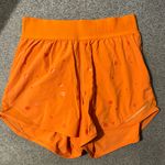 Lululemon Hotty Hot Short 4" *Logo
Poco Logo Foil Amber Orange Size 4 Photo 4