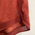 Athleta Women's Small Orange Zip Pocket Printed Mesh Racer Run Short 4” Inseam Photo 1