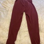 The North Face burgundy joggers size small. Super comfy and cute. Photo 4