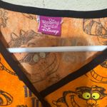 Disney Women's  Scrub Top XL Cheshire Cat Alice in Wonderland Halloween Orange Photo 1