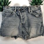 Almost Famous 0 Cross-Waist Jean Shorts Photo 0