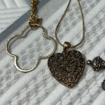 Set of 4 necklaces to gold two silver needs some cleaning worn each maybe once Photo 2