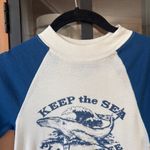 Urban Outfitters  mock neck baby tee long sleeve raglan whale save ocean top Photo 4