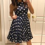 Adrianna Papell Gorgeous Navy and White Polka Dot Tea Dress with pleated skirt. Photo 0