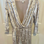 Adam Levine  silver velvet long sleeved romper Photo 0