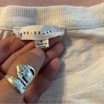 Jane and Delancey  white cotton t-shirt with silver beaded chain giraffe size S Photo 6