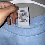 Sanrio NWT Hello Kitty Friends Snow Angel Crew Sweatshirt Woman’s M Baby Blue Photo 5