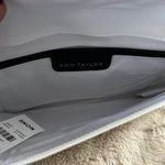 Ann Taylor  black and white magnetic clutch with gold trimming Photo 4