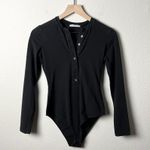 Reformation  nisa knit henley button long sleeve bodysuit in black Photo 1