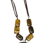 VTG Avon bronze cord authentic tigers eye medallion necklace. Photo 0