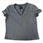 Nike Dri- Fit black and white striped V-neck Photo 0
