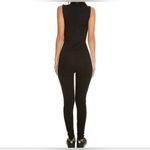 Puma Womens  black and white athletic jumpsuit‎ size small Photo 1