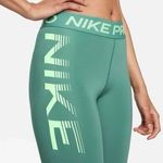 Nike  Pro Mid-Rise 7/8 Graphic Leggings Bicoastal Vapour Green White Size Small Photo 1