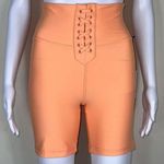 We Wore What  Solid Lace Up Biker in Peach Cobbler Photo 0