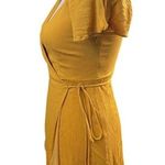 Lulus Lulu’s mustard yellow true wrap dress split flutter sleeve size medium dress. Photo 1