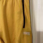 PINK - Victoria's Secret  Yellow Track Pants Photo 3