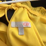 GB  Yellow Romper with Open Back Tassels and Ruffles Photo 4