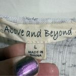 Brandy Melville Above and Beyond White/Black Speckled Babydoll Blouse Size L Photo 4