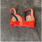 Lululemon  bright orange/navy blue sports‎ bra ( 32C ) Photo 7